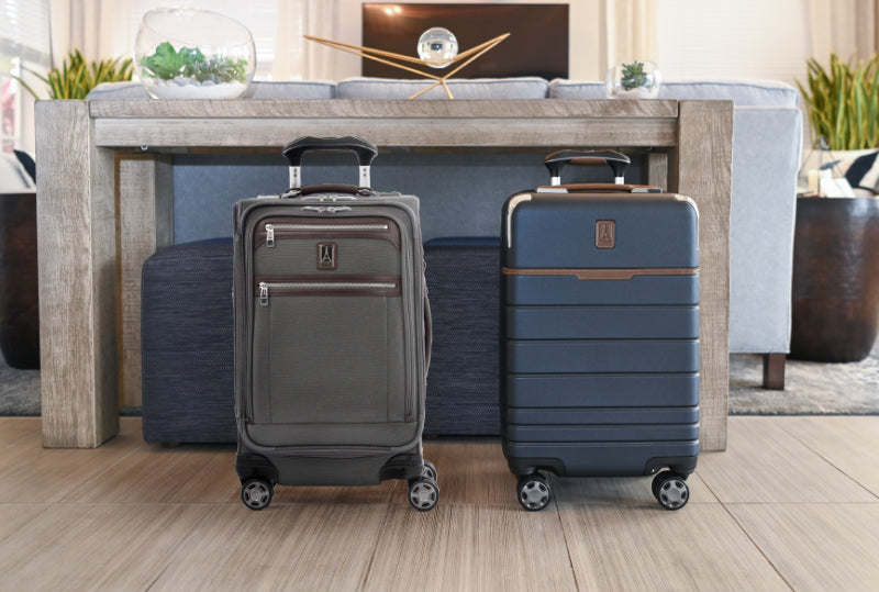 two pieces of luggage sitting side by side featuring a hardshell suitcase and a soft sided suitcase